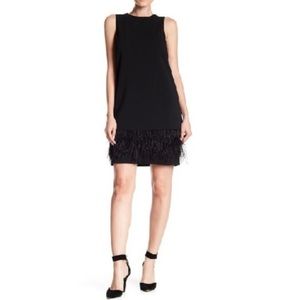 Calvin Klein Black Sheath Dress with feather bottom Size 4